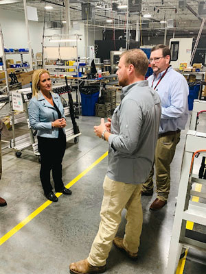 From left to right: Arkansas Attorney General Leslie Rutledge, Walther Arms VP of Marketing and Product Development, Jens Krogh, and Umarex USA President and CEO, Richard Turner
