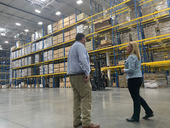 Turner and Rutledge tour the warehouse and discuss the challenges and successes of the past year.